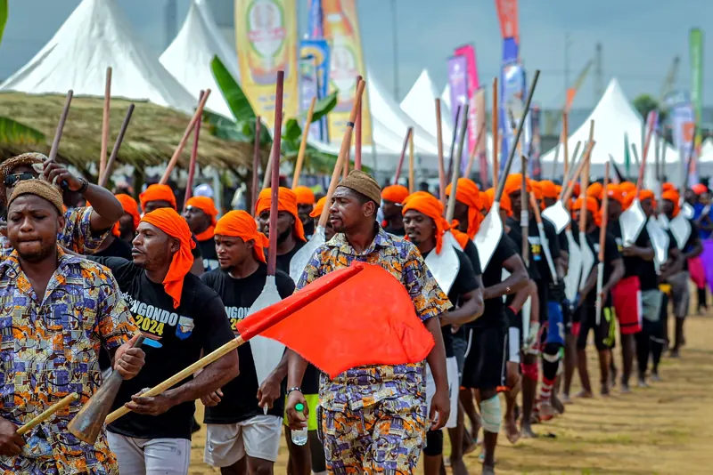 Paddlers parade at the Ngondo festival, Douala