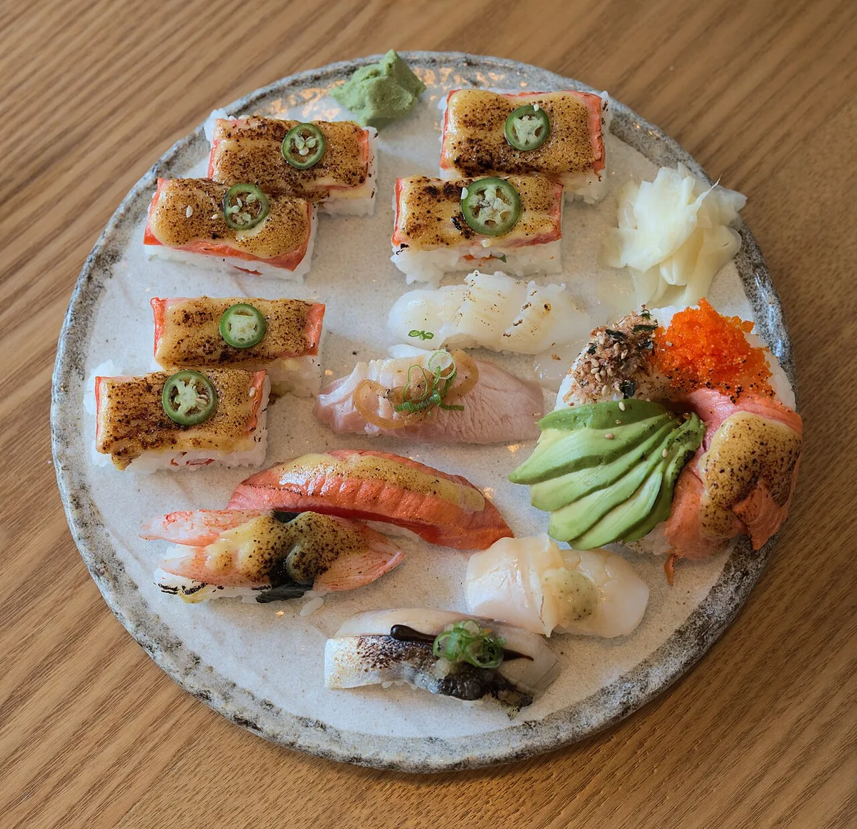 Aburi salmon oshi and nigiri, Vancouver style