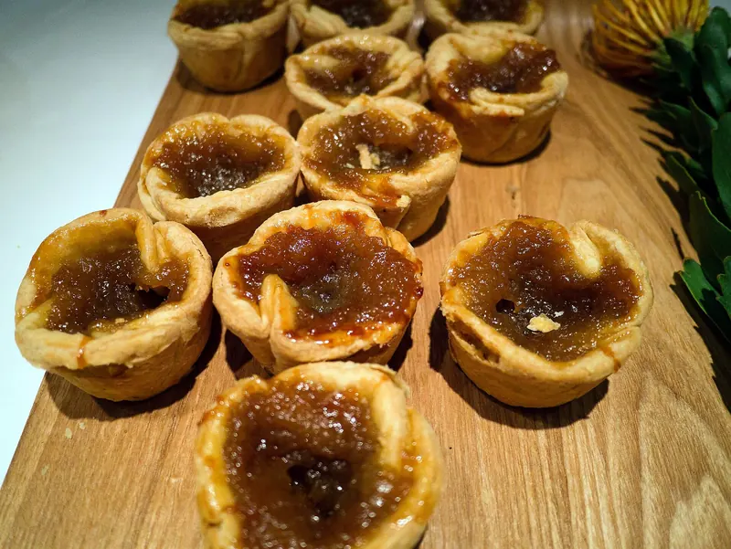Butter tarts on a cutting board