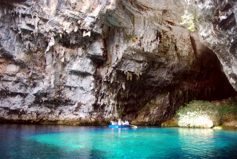 Boats on the underground lake of Melissani Cave, Kefalonia