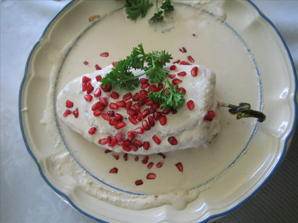 Chile en nogada: a poblano in walnut sauce with pomegranate