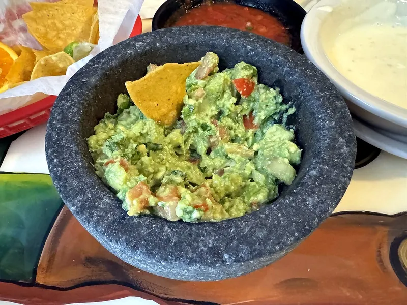 Guacamole served in a molcajete