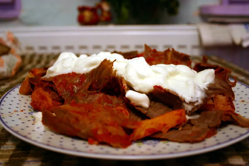 İskender kebap with tomato sauce and yogurt
