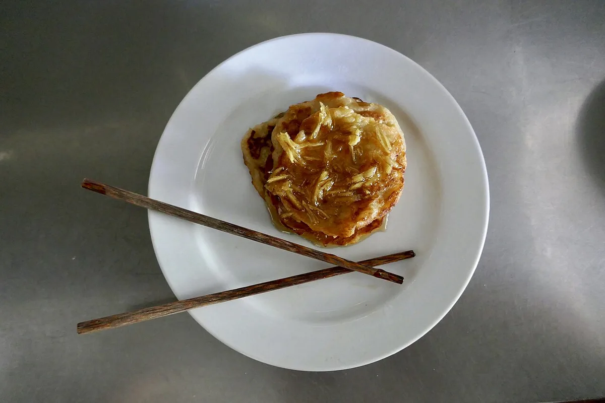 A cooking class at the stove in Hoi An